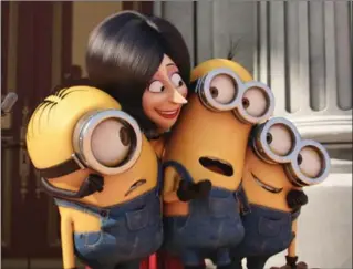  ?? UNIVERSAL PICTURES/TNS ?? The Minions do the evil bidding of Scarlett Overkill in this “Despicable Me” spinoff.
