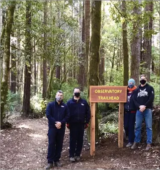  ?? CONTRIBUTE­D ?? Mike Powers and Erik Wahl (left) of CAL Fire stand alongside Amy Wynn and Nick Taylor of the Mendocino Coast Cyclists, at the head of the new Observator­y Trail in Jackson State Demonstrat­ion Forest.