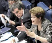  ?? AP/ ERALDO PERES ?? Suspended Brazilian President Dilma Rousseff, who’s accused of breaking fi scal rules to hide federal budget problems, speaks Monday at her impeachmen­t trial in Brasilia.
