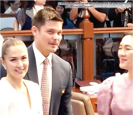  ?? PHOTO BY BERNADETTE TAMAYO ?? n Actor Dingdong Dantes and wife Marian Rivera arrive at the Senate to witness the passage of the Eddie Garcia bill.