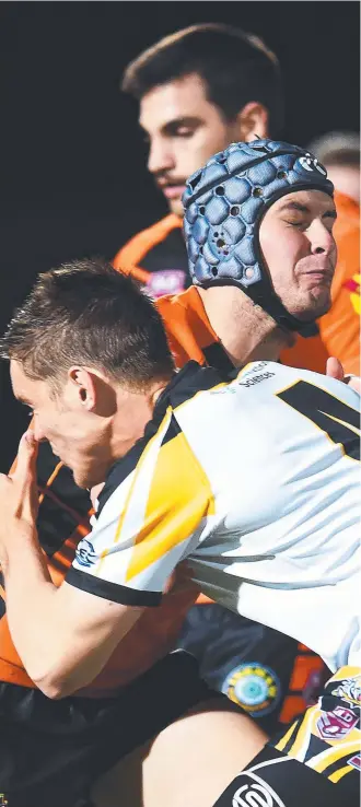  ?? Picture: ZAK SIMMONDS ?? STAR TURN: Crushers’ Dylan Gaggiano is tackled against the Central Tigers in the 2018 TDRL preliminar­y final. Gaggiano starred at fullback over the weekend.