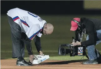  ?? DAVE SIDAWAY ?? Former Montreal Expos player Tim Raines is caught stealing second base one more time prior to the Pirates-Jays preseason game at Olympic Stadium Friday. Raines becomes a Hall of Famer this summer.