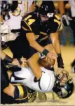  ?? MARK HUMPHREY ENTERPRISE-LEADER ?? Remember this. Brandon Nodier did his best to discourage opposing backs and receivers from coming anywhere near him with the football as shown in this photo from the 2012 state playoffs. Nodier was involved in 91 tackles as a senior.