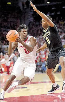  ?? NWA Democrat-Gazette/ANDY SHUPE ?? Arkansas’ Jaylen Barford (left) drives to the lane as he is pressured by Vanderbilt’s Saben Lee during the first half Saturday at Walton Arena in Fayettevil­le. Barford scored 16 points as the Razorbacks won 72-54.