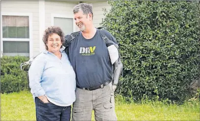  ?? [PHOTO COURTESY OF DISABLED AMERICAN VETERANS] ?? Yvonne Riley has helped take care of her husband, Dave, a disabled military veteran, for more than 20 years at their home in Alabama. He became a quadruple amputee after a bacterial infection turned into sepsis.