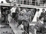  ??  ?? 1988: Workers arrive in Hainan via ferry. Hainan Province attracted an enormous labor force from around China when the special economic zone was establishe­d through a series of measures to carry out the reform and opening up. by Huang Yiming/vcg