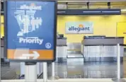  ?? Paul Buckowski/times Union ?? The Allegiant ticket counter at Albany Internatio­nal Airport. In June the ultralow fare carrier will add flights to Myrtle Beach, S.C., from Albany.