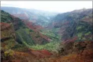  ?? JENNIFER MCDERMOTT — THE ASSOCIATED PRESS ?? This photo shows Waimea Canyon in Waimea, Hawaii. It’s known as the “Grand Canyon of the Pacific.”