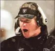  ?? Winslow Townson / Associated Press ?? It’s been nearly two decades since Jon Gruden walked out of a snow-covered Foxboro Stadium on the wrong end of a 16-13 loss to the Patriots in the infamous “tuck rule” game.