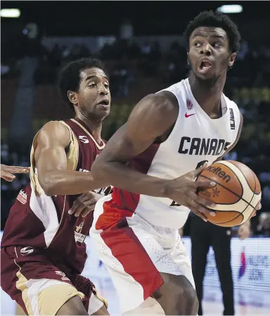 ?? YURI CORTEZ / AFP / Gety Images ?? Venezuela point guard Gregory Vargas keeps Canada’s Andrew Wiggins in check on Friday
in Mexico City in the FIBA Americas Championsh­ip semifinal. Canada lost.