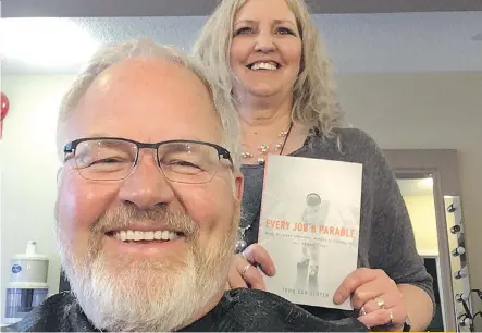  ??  ?? Pastor John Van Sloten gets a trim from Anita Roeke of Aahs Hair Studio. She’s holding the pastor’s latest book, Every Job A Parable. It’s about the sacredness of work in our city, he says.