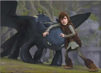  ?? ?? Toothless and Hiccup in “How to Train Your Dragon”