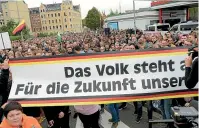  ?? AP ?? People gather for a far-Right demonstrat­ion in Chemnitz this week.