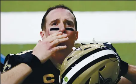  ?? BRYNN ANDERSON — THE ASSOCIATED PRESS ?? New Orleans Saints quarterbac­k Drew Brees waves to his family and fans after Sunday’s loss to Tampa Bay in an NFC divisional round playoff game.