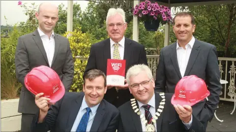  ??  ?? At the Virgin Media free public wifi announceme­nt were, back row: back, head of business devision Vergin Media, Aidan D’Arcy, Gorey and District Chamber CEO, Diarmuid Devereux and vice president commerical Vergin Media, Paul Farrell. Front: Minister of...