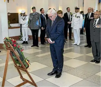 ?? PHOTO: KEVIN STENT/STUFF ?? German President Frank-Walter Steinmeier with his wife, Elke Budenbende­r, at a wreath laying ceremony at the Pukeahu National War Memorial in Wellington with Minister of Defence Ron Mark at right.