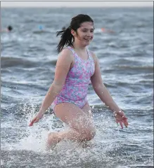  ??  ?? Swimmer Debra O’Connor pictured braving the icy waters for the ‘Polar Plunge’ at Fenit on Sunday morning.