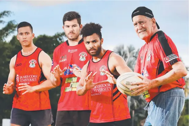  ?? Picture: JUSTIN BRIERTY ?? MILESTONE MEN: Head coach Alan ‘Doc’ McMahon puts JCU Mariners Claude Thomsen, Scott Winkworth and Dudley Miles through their paces.