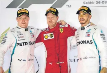  ?? AP ?? Ferrari’s Sebastian Vettel (centre), Mercedes’ Valtteri Bottas (left) and Lewis Hamilton after the race. 9. Marcus Ericsson 10. Esteban Ocon +0.699s 8. Stoffel Vandoorne +6.512s +62.234s 5. Kevin Magnussen+75.046s 6. Nico Hulkenberg+99.024s 7. Fernando Alonso + 1 lap + 1 lap +1 lap + 1 lap