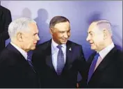  ?? Radek Pietruszka EPA/Shuttersto­ck ?? MIKE PENCE, from left, joins Poland’s Andrzej Duda and Israel’s Benjamin Netanyahu in Warsaw.