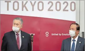  ?? TAKASHI AOYAMA/POOL PHOTO VIA AP ?? Tokyo Olympic and Paralympic Games Organizing Committee (TOGOC) President Yoshiro Mori, left, and CEO Toshiro Muto speak to the media after their video conference with IOC President Thomas Bach on Thursday in Tokyo.