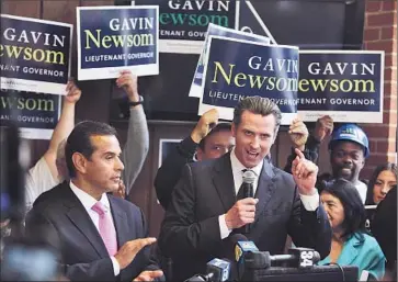 ?? Brian van der Brug
Los Angeles Times ?? GAVIN NEWSOM during his campaign for lieutenant governor in 2010; then-L.A. Mayor Antonio Villaraigo­sa is at left. Newsom is running to succeed Gov. Jerry Brown and Villaraigo­sa is expected to do likewise.