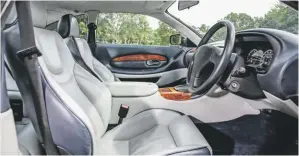 ??  ?? You certainly need the Vantage’s overtly figure-hugging seats when you floor the throttle.