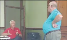  ?? / Sean Williams ?? Top: Rethink Rockmart members gathered for a lunch meeting near the end of May to get the group going again on projects this summer. Above: Jeff Ellis and Sherman Ross discuss the potential for a Land Bank in Polk County at the meeting.