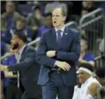 ?? TED S. WARREN — THE
ASSOCIATED PRESS ?? Washington head coach Mike Hopkins is one of the most surprising stories in college basketball is what he is doing in his first season at Washington and how the Huskies are in the conversati­on for an NCAA bid entering February.
