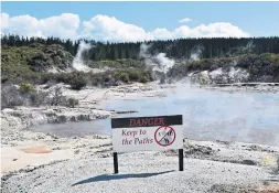  ??  ?? A warning sign at Hell's Gate thermal park in New Zealand.