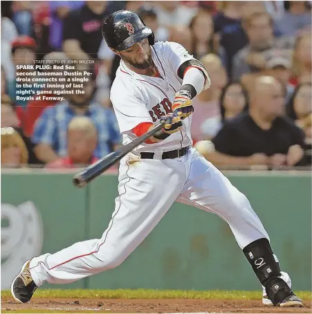  ?? STAFF PHOTO BY JOHN WILCOX ?? SPARK PLUG: Red Sox second baseman Dustin Pedroia connects on a single in the first inning of last night’s game against the Royals at Fenway.