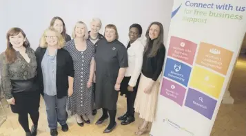  ??  ?? 0 Susan Harkins (third from right) and Rachel Sneddon (far right) with some of the WIB cohort