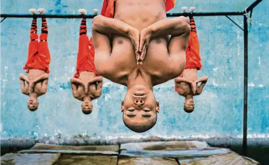  ?? Steve McCurry/Contribute­d photo ?? “Shaolin Monks Training” by Steve McCurry. The photograph­er’s work will be on display at the Cavalier Gallery in Greenwich through March 9.