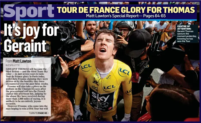  ??  ?? CENTRE OF ATTENTION: Geraint Thomas savours the moment yesterday, knowing he has won the Tour