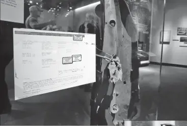  ?? Associated Press photo ?? A piece of the rented van, and rental agreement, that began leading investigat­ors to Muslim extremists who sought to punish the United States for its Middle East policies, according to prosecutor­s, in the Feb. 26, 1993 attack at the World Trade Center,...