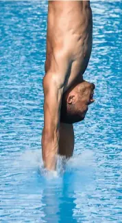  ?? — AFP ?? Frandiel Gomez competes in the men’s diving 10m Platform final event at the Central American and Caribbean Games at the aquatic complex in Barranquil­la, Colombia, on Tuesday.