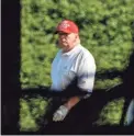  ?? GREG LOVETT/THE PALM BEACH POST ?? President Donald Trump plays golf at his Trump Internatio­nal Golf Club in West Palm Beach on Dec. 28.