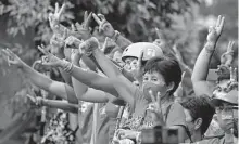  ?? Aaron Favila / Associated Press ?? Supporters celebrate Ferdinand Marcos Jr.’s presidenti­al win Tuesday in the Philippine­s before an official count came out.