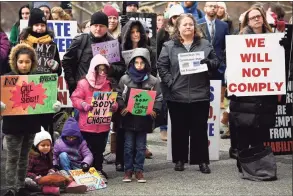  ?? Jessica Hill / Associated Press ?? Opponents to ending the religious exemption from the state’s school vaccinatio­n requiremen­ts gather outside the state Capitol in Hartford on Feb. 5, 2020.