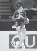  ?? Canadian Press photo ?? Rika Kihira, of Japan, skates during the ladies free skate at the Grand Prix of Figure Skating finals in Vancouver, Saturday.