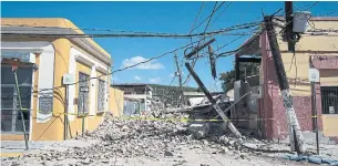  ?? ERIC ROJAS GETTY IMAGES ?? Tuesday’s magnitude 6.4 earthquake in Puerto Rico was the strongest to hit the U.S. territory since October 1918, when a magnitude 7.3 quake struck near the island’s northwest coast.