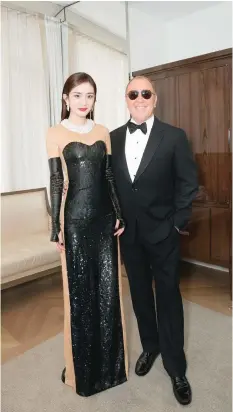  ?? MICHAEL KORS PHOTO ?? Chinese actress Yang Mi is pictured with designer Michael Kors at the 2017 MET Gala.