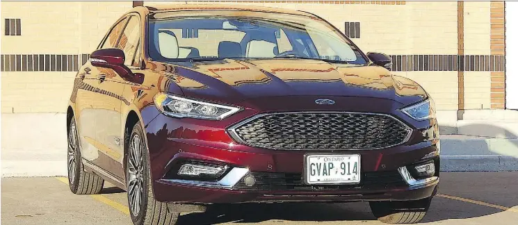  ?? BRIAN HARPER ?? The 2018 Ford Fusion Energi can travel about 1,000 kilometres on a full tank of gas and battery charge.