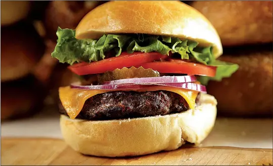  ?? Los Angeles Times/TNS/KIRK MCKOY ?? Take your burgers up a notch by serving them on homemade buns.