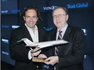  ?? LARRY BUSACCA/ GETTY IMAGES FOR VISTAJET ?? Thomas Flohr, left, CEO of VistaJet and Steve Ridolfi, president of Bombardier, sealed a major deal this year.