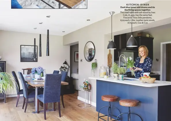 ??  ?? KITCHEN- DINER Dark blue tones add drama and tie the living spaces together. the steel table with ash wood by Ines Cole, £1,495, has the same feel. Foscarini tress Stilo pendants, £319 each, i-lite. Leather twist stools, £175 each, Cox & Cox
