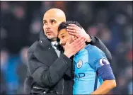  ?? PHIL NOBLE / REUTERS ?? Manchester City manager Pep Guardiola comforts Gael Clichy after Wednesday’s scoreless draw with Stoke City in their English Premier League match at Etihad Stadium.