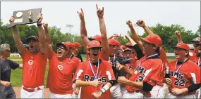  ?? Matthew Brown / Hearst Connecticu­t Media ?? Cheshire coach Bill Mrowka, left, holds up the championsh­ip plaque as the Rams celebrate winning the CIAC Class LL championsh­ip 1-0 over Ridgefield on Saturday at Palmer Field in Middletown.