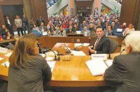  ?? Supervisor David Canepa’s office ?? San Mateo County Supervisor David Canepa speaks with panelists at Daly City’s City Hall about Seton Medical Center during a packed townhall meeting.