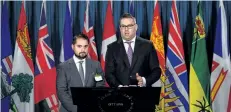  ?? SEAN KILPATRICK/THE CANADIAN PRESS ?? Lawyers Marc-Andre Seguin, left, and Michael Simkin speak during a news conference on Parliament Hill in Ottawa on Monday.